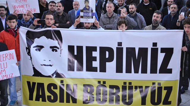 A crowd stage an anti-terror protest to condemn killing of the 16-year-old teen, Yasin Börü,