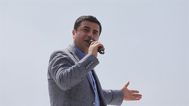 Selahattin Demirtas, co-chairman of the pro-Kurdish Peoples' Democracy Party (HDP), addresses his supporters during an election rally for Turkey's June 7 parliamentary elections in Istanbul, Turkey May 24, 2015.   REUTERS/Osman Orsal