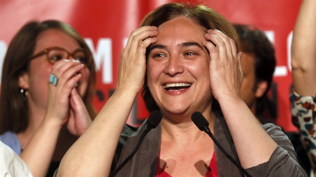 Ada Colau, leader and local candidate of "Barcelona en Comu" party, reacts as she celebrates her victory after the regional and municipal elections in Barcelona,Spain, May 24, 2015. Spain's ruling People's Party (PP) took a battering in regional elections on Sunday with Spaniards punishing Prime Minister Mariano Rajoy for four years of severe spending cuts and a string of corruption scandals. REUTERS/Albert Gea