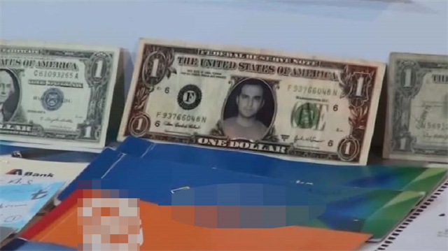 Ele geçirilen 1 dolarlık banknotlardan birinde Murat Kılıç'ın fotoğrafının yer alması dikkat çekti.