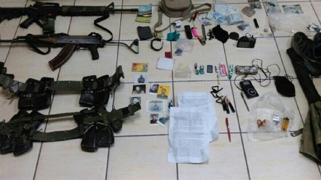 Teröristlere ait çok sayıda silah ve mühimmat ele geçirildi. 
