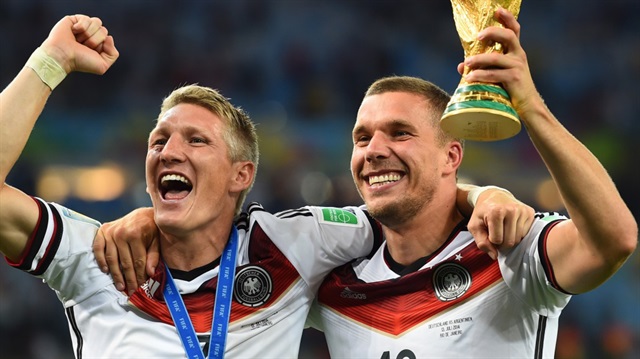  Schweinsteiger ve Podolski, 2014 yılında kazanılan Dünya Kupası'nı kutluyor. 