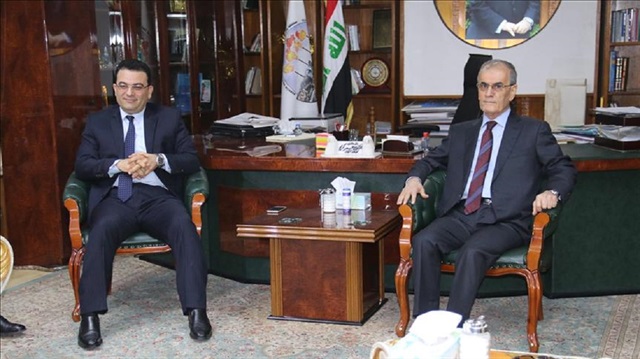 Iraqi minister for Immigration and Immigrants Derbaz Mohammed (L) meets with Governor of Kirkuk Najmaldin Karim (R) during his official visit to Kirkuk, Iraq on February 14, 2016. 
