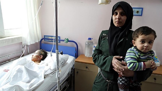 A wounded Syrian girl who lost two of her siblings and her mother during clashes, receives medical treatment at State Hospital of Antakya District located at Turkey's Syria Border.