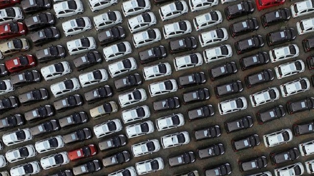 Electric cars are seen at a parking lot of an automobile factory in Xingtai, Hebei province, China April 26, 2016. 
