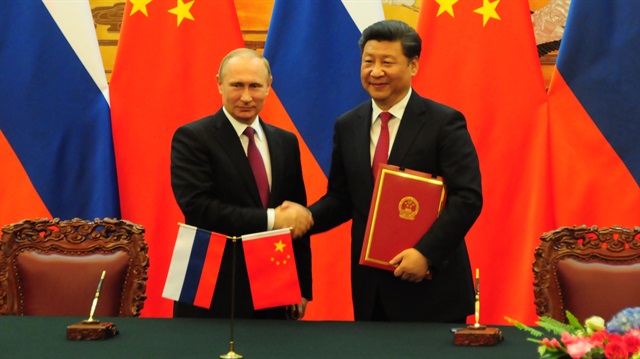 Rusya Devlet Başkanı Vladimir Putin'in, Çinli mevkidaşı Şi Cinping. 