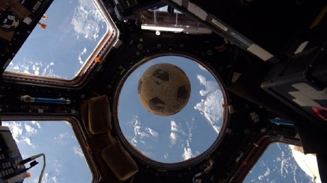  Kimbrough grabbed his camera and took a photo of the floating football upong noticing it from his window.
