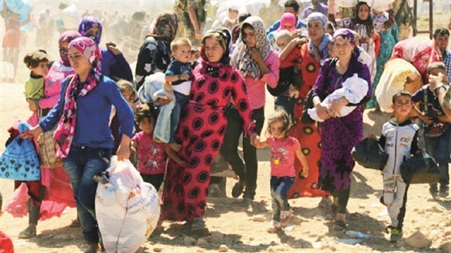 At least 300,000 have fled to Iraqi Kurdistan and more than 200,000 have fled to Turkey.