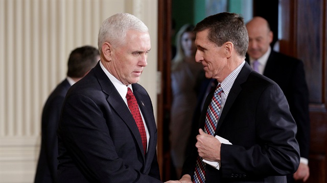 US Vice President Mike Pence greets National Security Advisor Michael Flynn.