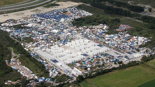 An aerial view shows tents and makeshift shelters of the camp called the "Jungle" in Calais