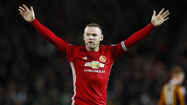 Çin'e gideceği iddia edilen Wayne Rooney, sezon sonuna kadar Manchester United'da kalacak. 