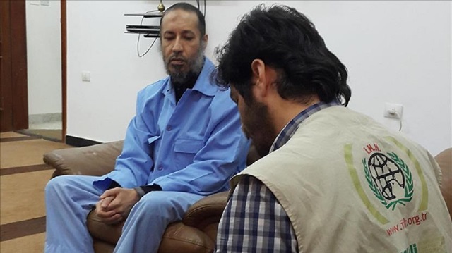 A member of the Foundation for Human Rights and Freedoms and Humanitarian Relief (IHH), a Turkish NGO, talk with Saadi Gaddafi, late Libyan leader Muammar Gaddafi's son during their visit at Al-Hadba prison, in Tripoli, Libya on February 23, 2017. IHH is informed about the health conditions of Saadi Gaddafi.