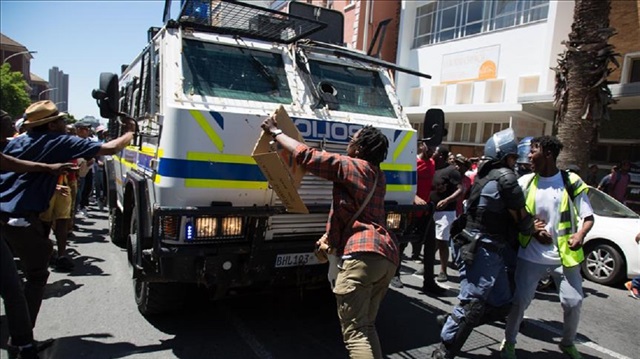 A protest in South Africa dispersed by police forces