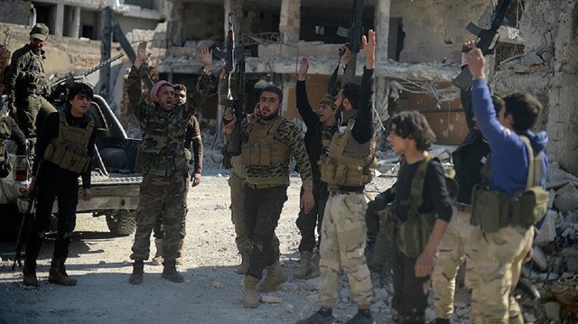 FSA fighters celebrate liberation of Al-Bab