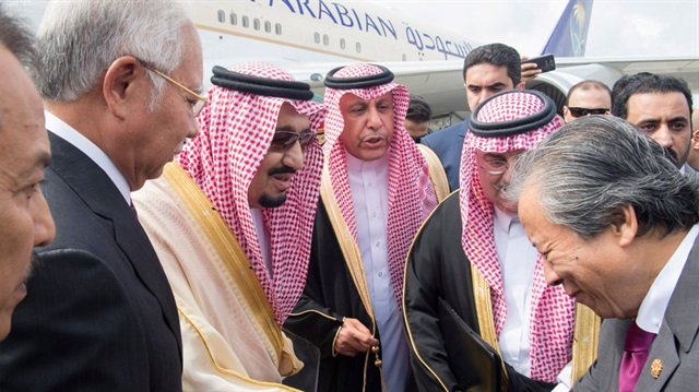 Saudi Arabia's King Salman is welcomed upon his arrival in Kuala Lumpur, Malaysia