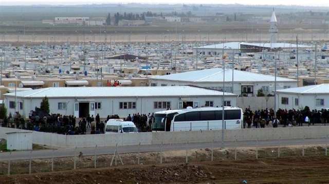 The first batch of freshly trained police officers boarded buses bound for Azaz from Kilis