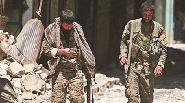 ABD'nin destek verdiği terör örgütü PKK/PYD çocukları zorla silah altına alıyor.