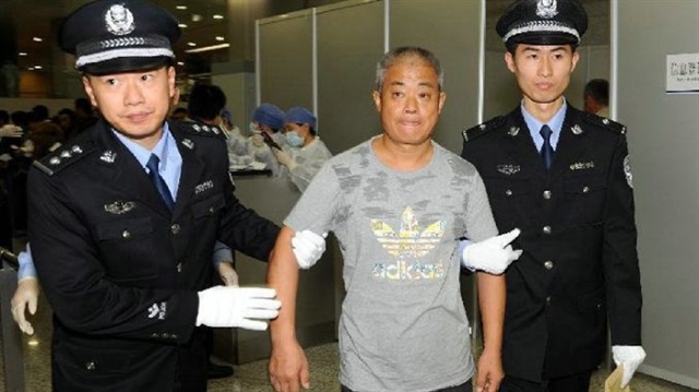 Chinese security forces capture corruption suspect