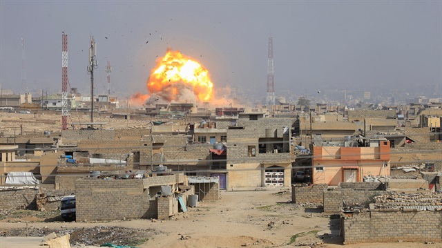Smoke rises after an airstrike, during the battle against Daesh militants in Mosul, Iraq
