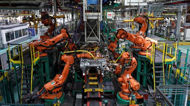 Robots assemble Renault and Nissan automobiles on the production line at the Renault SA 