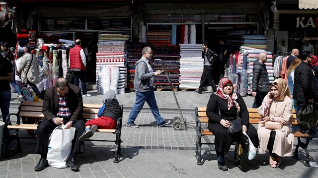 People are seen at the Eminonu shopping district in Istanbul