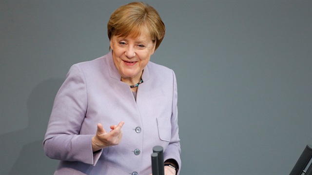 German Chancellor Angela Merkel addresses the lower house of parliament Bundestag 