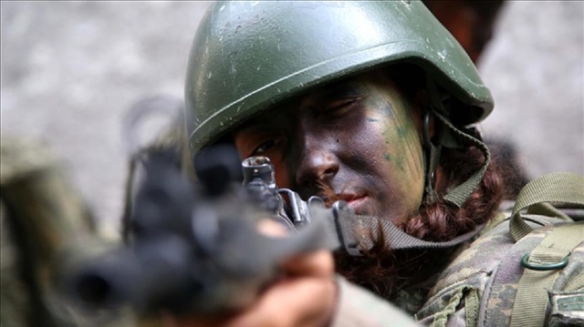 Sergeant Arzu Oguz, 23, the first female trainee attending the Commando Specialization Course which is shown among the world's toughest military trainings at the Egirdir Mountain Commando School and Training Center Command, takes part in the military training in Isparta, Turkey on April 18, 2017.