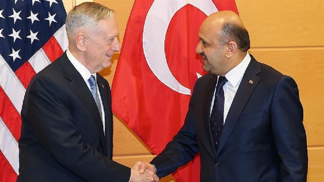 Defense Minister Fikri Isik and his U.S. counterpart James Mattis