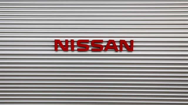 The logo of Nissan Motor Co is pictured at a showroom at the carmaker's headquarters