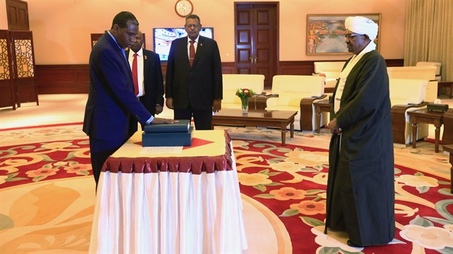 Sudan’s Minister of Presidential Affairs Fadl Abdallah Fadl takes the oath of office