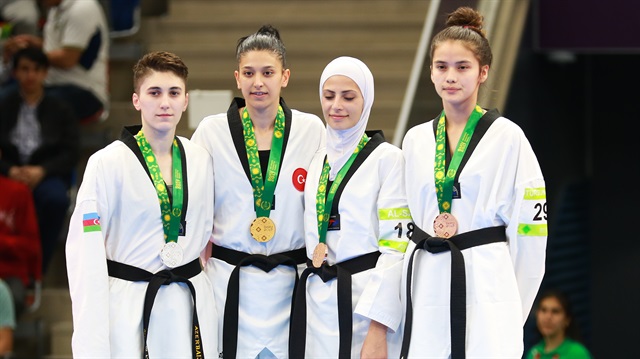 Nur Tatar ve Nafia Kuş’tan altın madalya