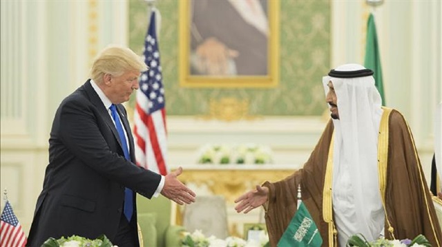 U.S. President Donald Trump (L) meets Saudi Arabia's King Salman bin Abdulaziz Al Saud (R) at Al-Yamamah Palace in Riyadh, Saudi Arabia on May 20, 2017.