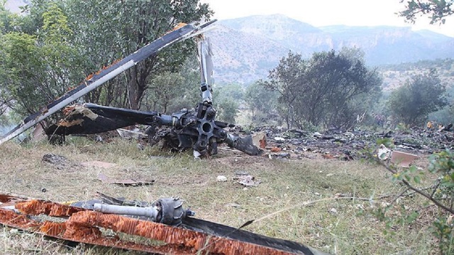 All 13 military personnel aboard perished in the crash.
