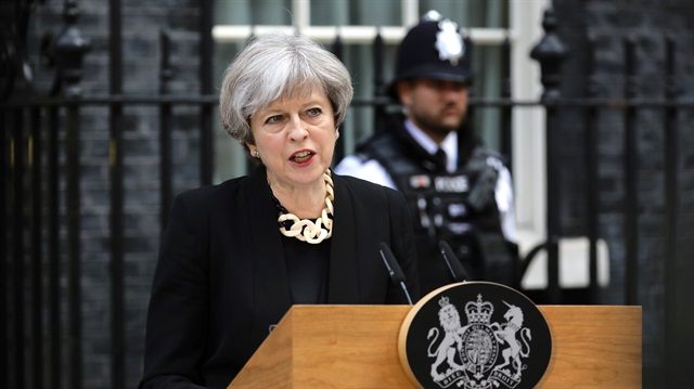 Britain's Prime Minister Theresa May speaks outside 10 Downing Street after an attack on London Bridge and Borough Market left 7 people dead and dozens injured in London, Britain, June 4, 2017. 