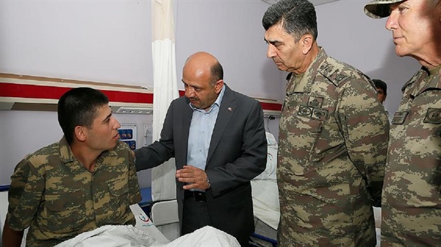 Minister of Defense Fikri Işık visited the ill troops. 