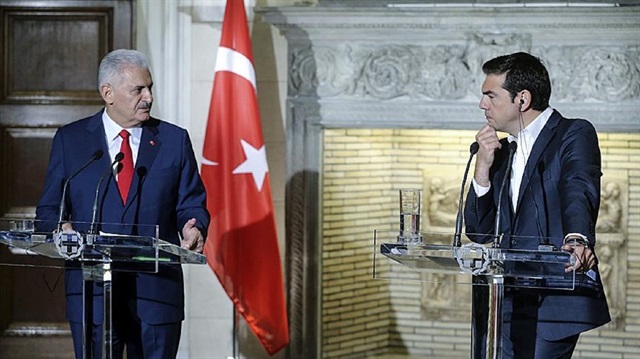 Prime Minister of Turkey Binali Yıldırım (L) and the Prime Minister of Greece Alexis Tsipras (R) hold a joint press conference following their meeting, in Athens, Greece on June 19, 2017.