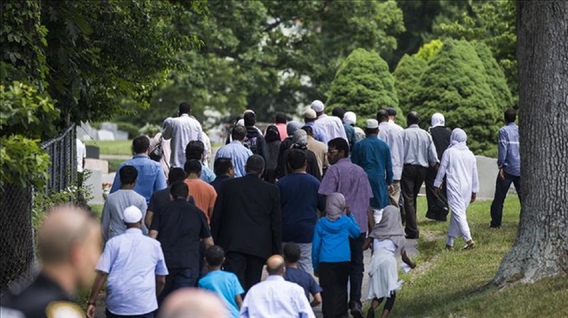 Mourners walk into Sterling Cemetery where Nabra Hassanen, who was murdered Sunday on her way back to an overnight event at the All Dulles Area Muslim Society, will be laid to rest in Sterling, Va., USA on June 21, 2017.
