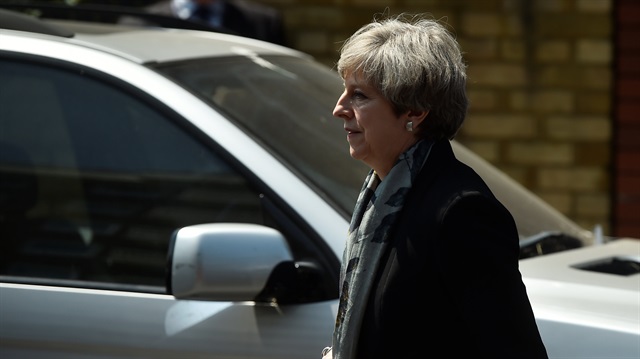 Britain's Prime Minister Theresa May leaves after visiting the Finsbury Park Mosque