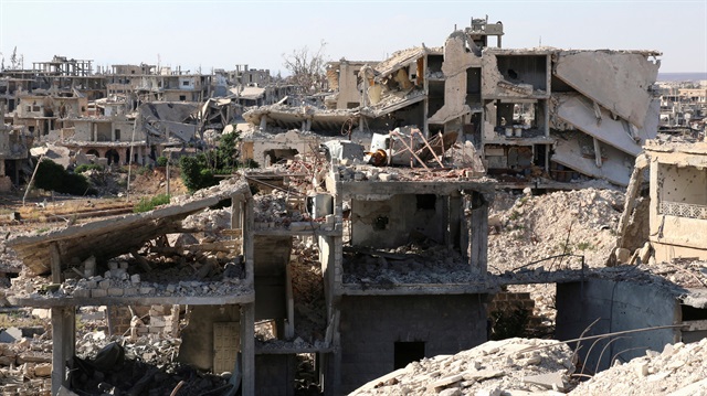 A general view shows damaged buildings in the southern city of Deraa, Syria.