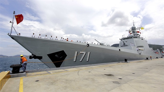 Chinese naval destroyer Haikou gets ready to depart for the Rim of the Pacific exercise (RIMPAC