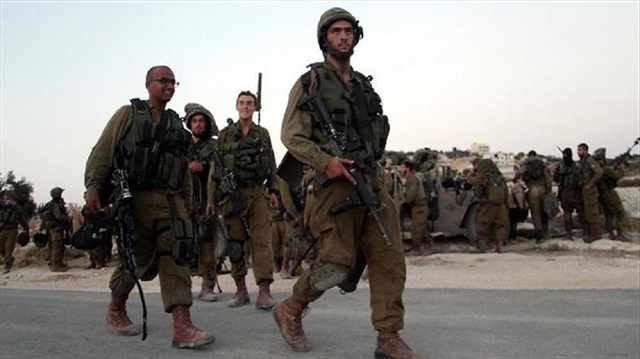Ten Palestinians were rounded up by Israeli forces in raids in the West Bank.