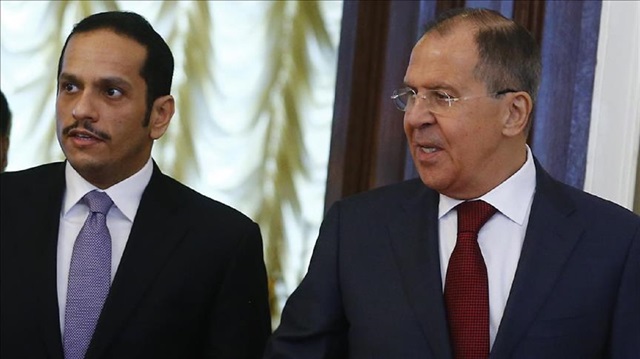 Russian Foreign Minister Sergey Lavrov (R) and Foreign Minister of Qatar Mohammed bin Abdulrahman bin Jassim Al-Thani