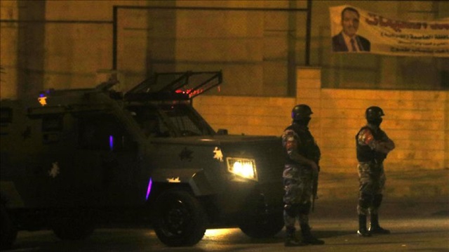 Jordanian security forces are seen as they sealed off the scene and blocked entries to the area after one Jordanian was killed and an Israeli was injured in a violent incident at the Israeli embassy in Jordan on July 23, 2017. 