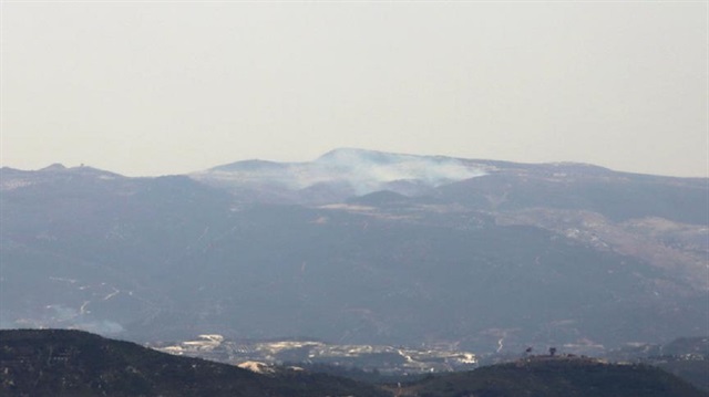 Suriye sınırındaki orman yangının kontrol altına alındığı açıklandı.