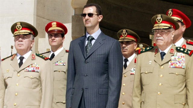 Syrian President Bashar al-Assad (C)