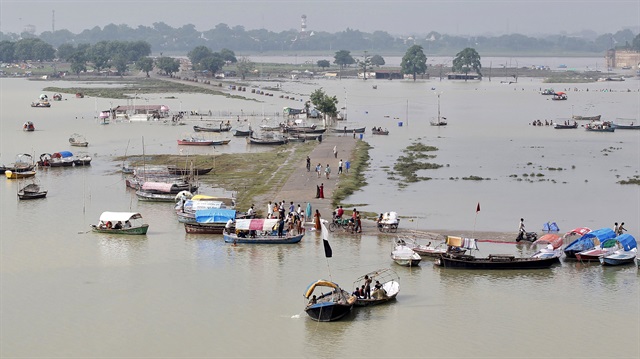 A view of a flooded road on the banks of river Ganga, pictured after heavy monsoon rains 
