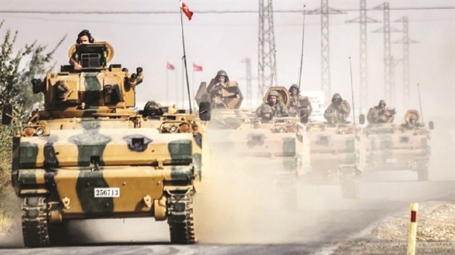 Turkish tanks and troops in Syria. 