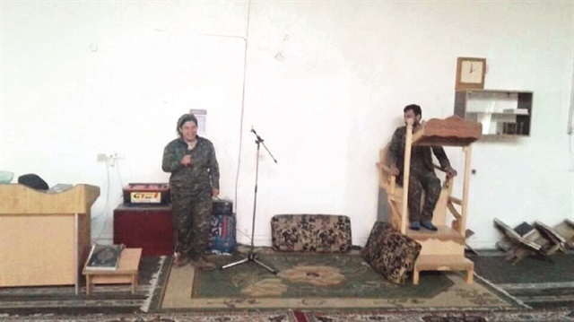 PKK/PYD terrorists take photos showing them mocking Muslims' sacred beliefs in Afrin's mosques