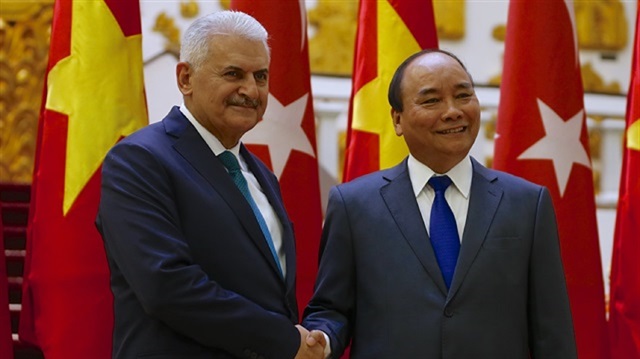 Prime Minister Binali Yıldırım (L) and his Vietnamese counterpart Nguyen Xuan Phuc