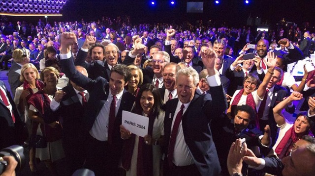  Mayor of Paris Anne Hidalgo and delegates from Paris 2024 celebrate after IOC President Thomas Bach announced the winners of the Olympic Games of 2024 and 2028 during the 131st International Olympic Committee Session at the Lima Convention Center in Lima, Peru